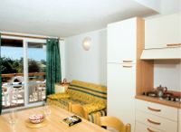 Residence Marina di Pinarello soggiorno con angolo cucina