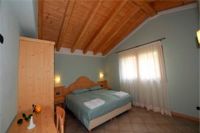 Residence Raggio di Luce,Appartamento Agrimony camera
