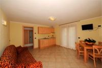 Residence Raggio di Luce,Appartamento Evening Primerose soggiorno
