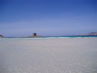 Stintino,La Pelosa spiaggia di sabbia bianca e un mare limpidissimo