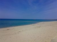 Gallura,Badesi, il mare turchese che lambisce la spiaggia lunga 8 Km.
